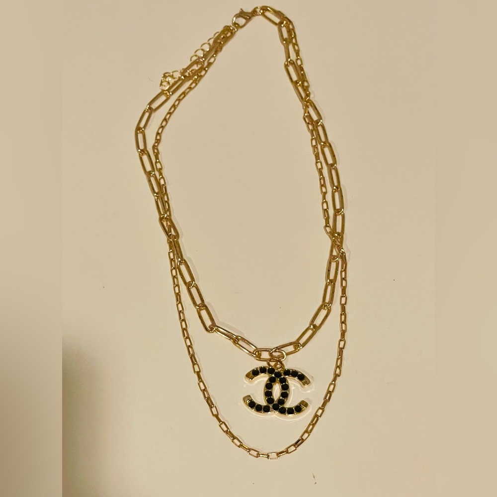 Gold and black authentic CC button necklace